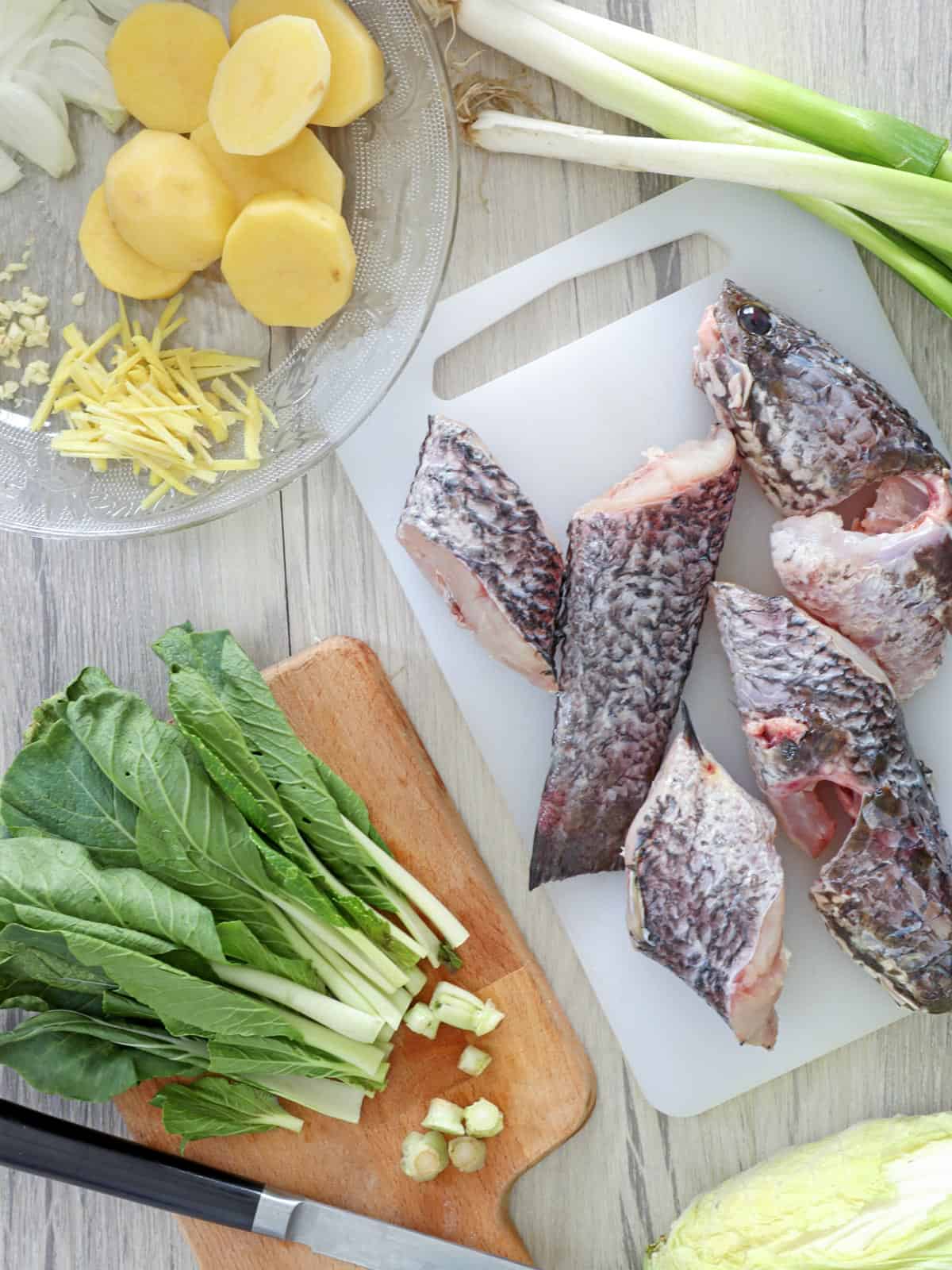raw mudfish and vegetables to make pesang isda