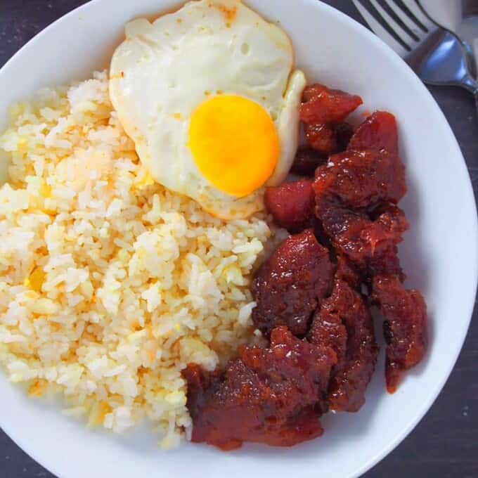 top view of pork tocilog on a white plate