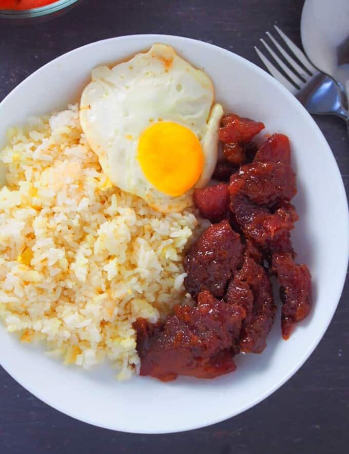 top view of pork tocilog on a white plate