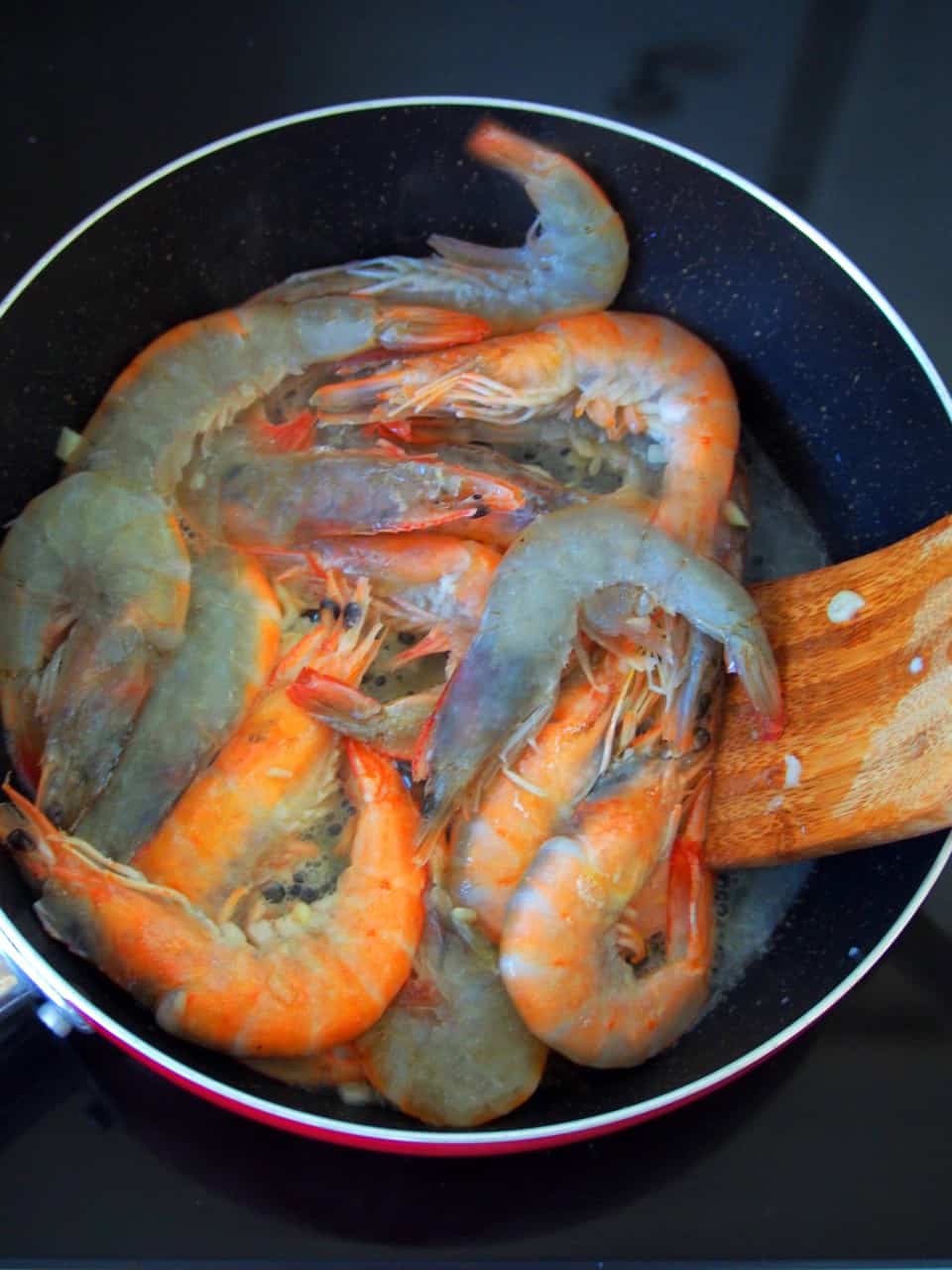 cooking halabos na hipon in a pan