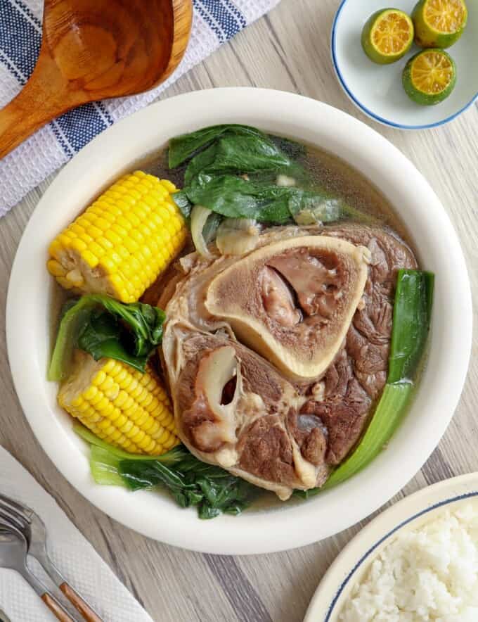 bulalo in a bowl with steamed rice on the side