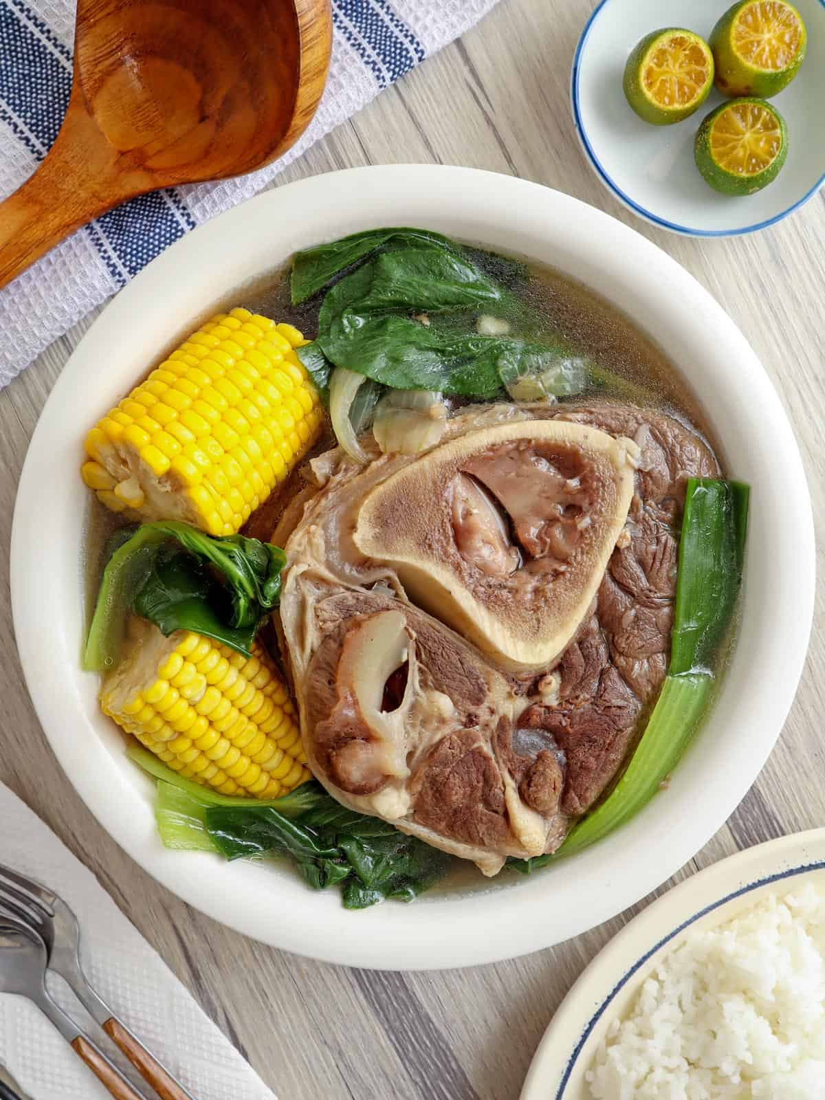 bulalo in a bowl with steamed rice on the side