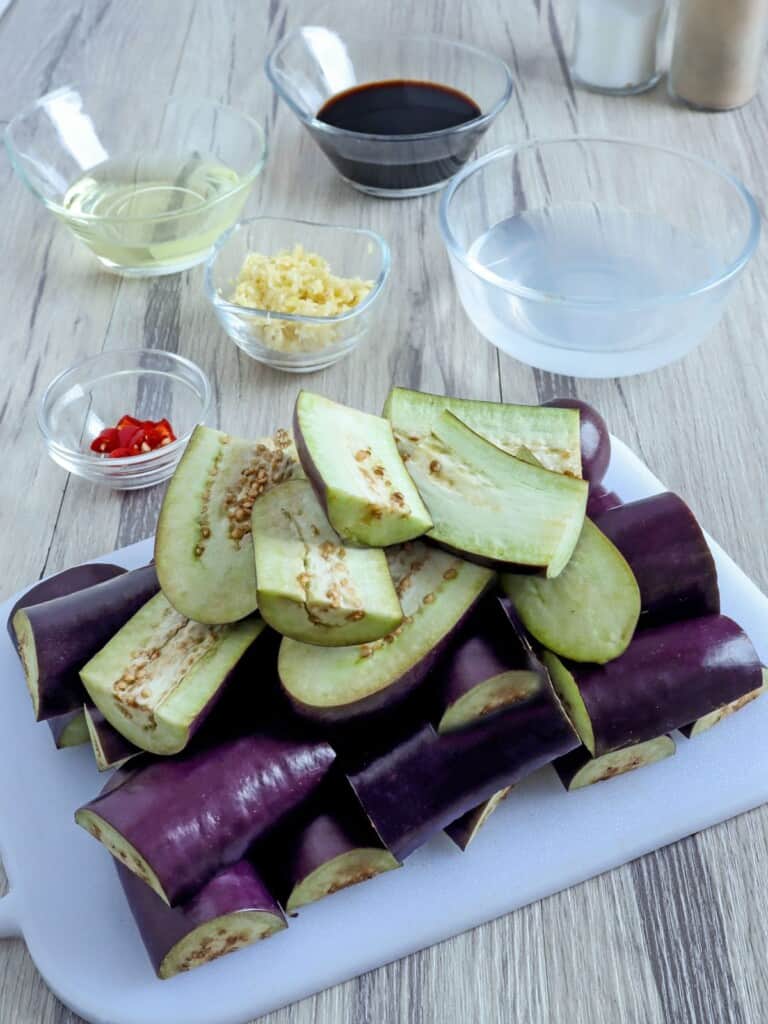 sliced eggplants, minced garlic, chili peppers, vinegar, soy sauce