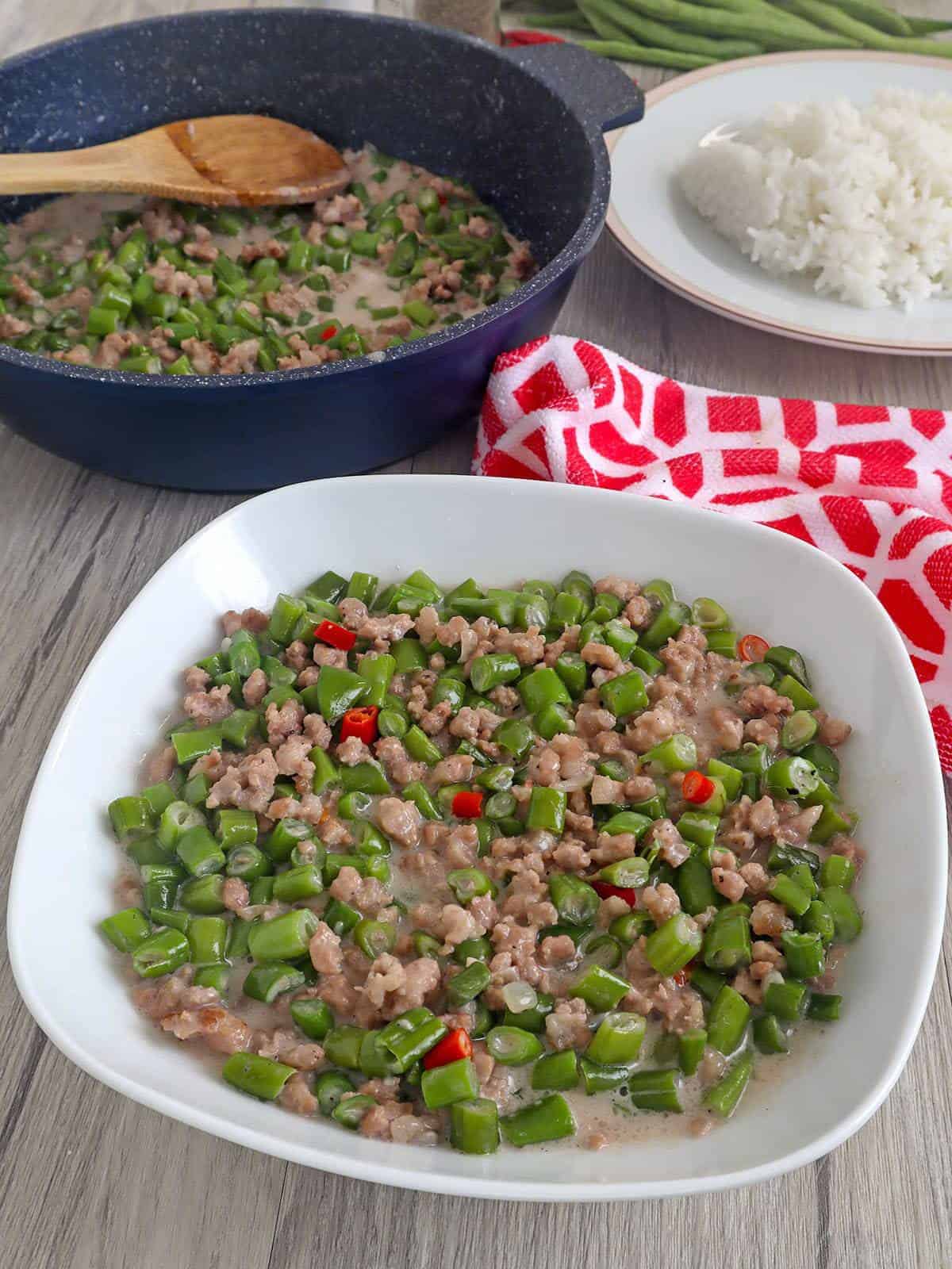 Gising gising with green beans in a white serving bowl