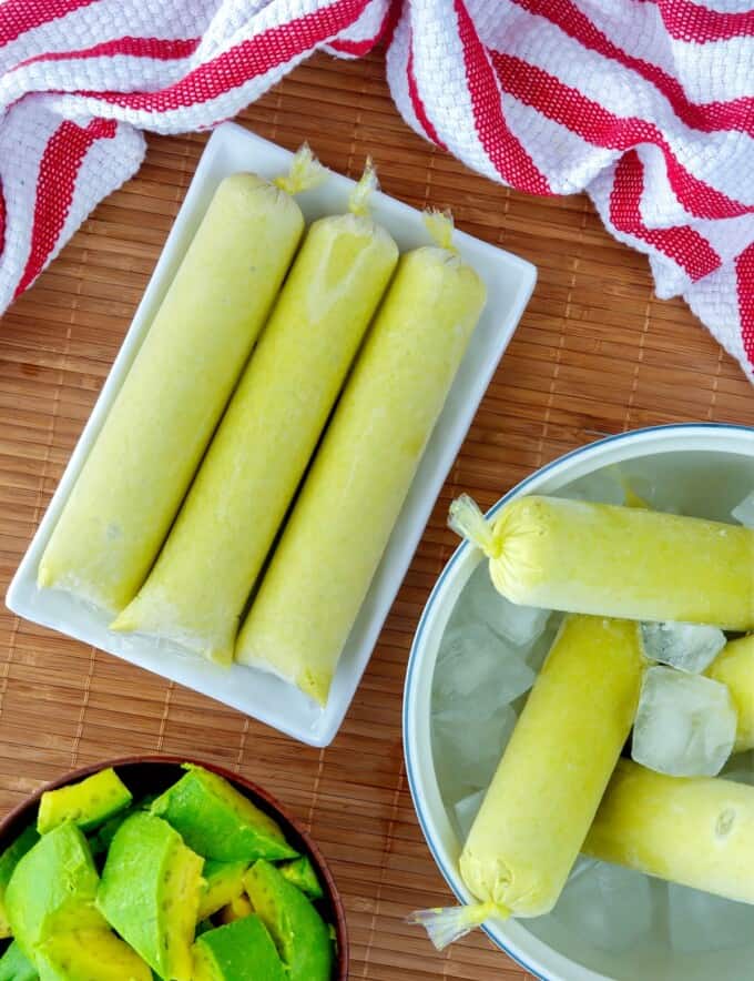 avocado ice candies on a white bowl of ice.