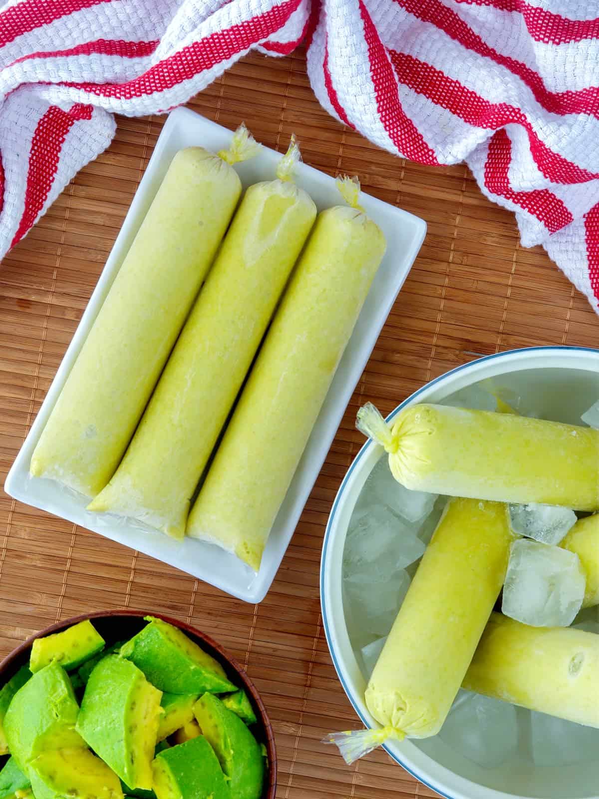 avocado ice candies on a white bowl of ice. 