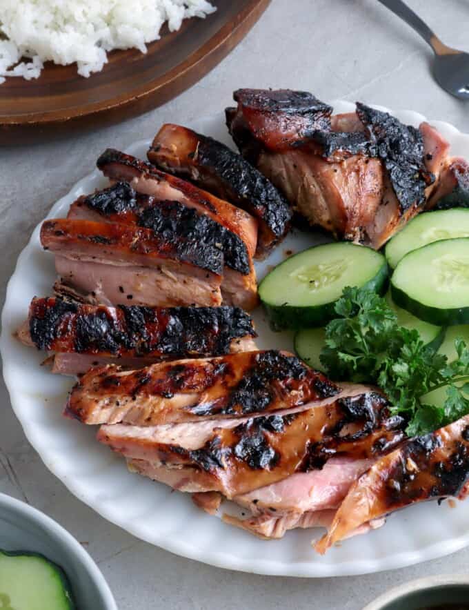 sliced Grilled Tuna Belly on a white plate