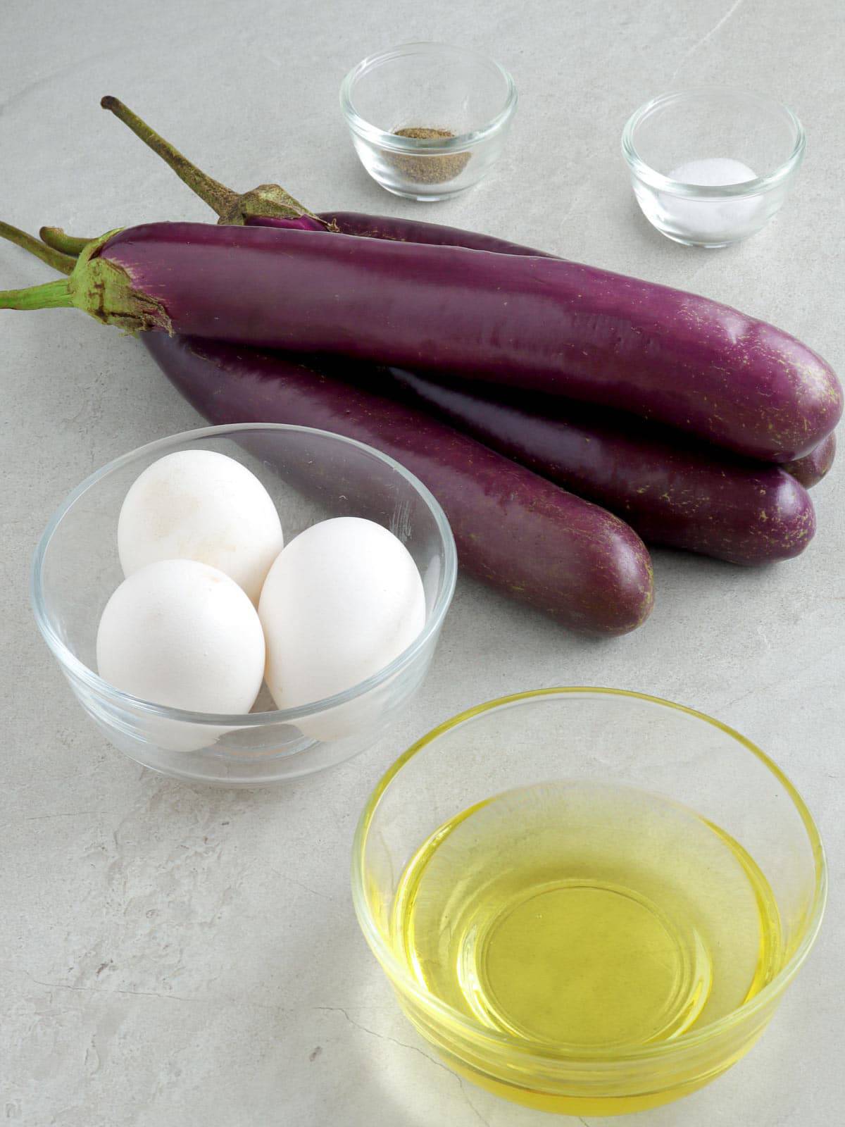 eggplants, eggs, canola oil, salt, and pepper