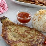 eggplant omelette on a plate with steamed rice and ketchup
