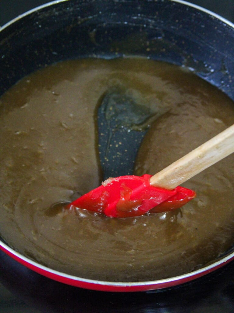 cooking coconut jam in a pan
