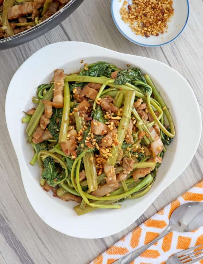 Adobong Kangkong in a white serving bowl