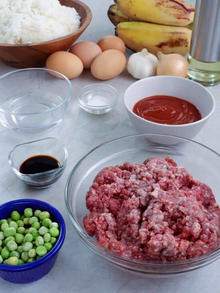 ground beef, green peas, tomato sauce, saba bananas, eggs, steamed rice