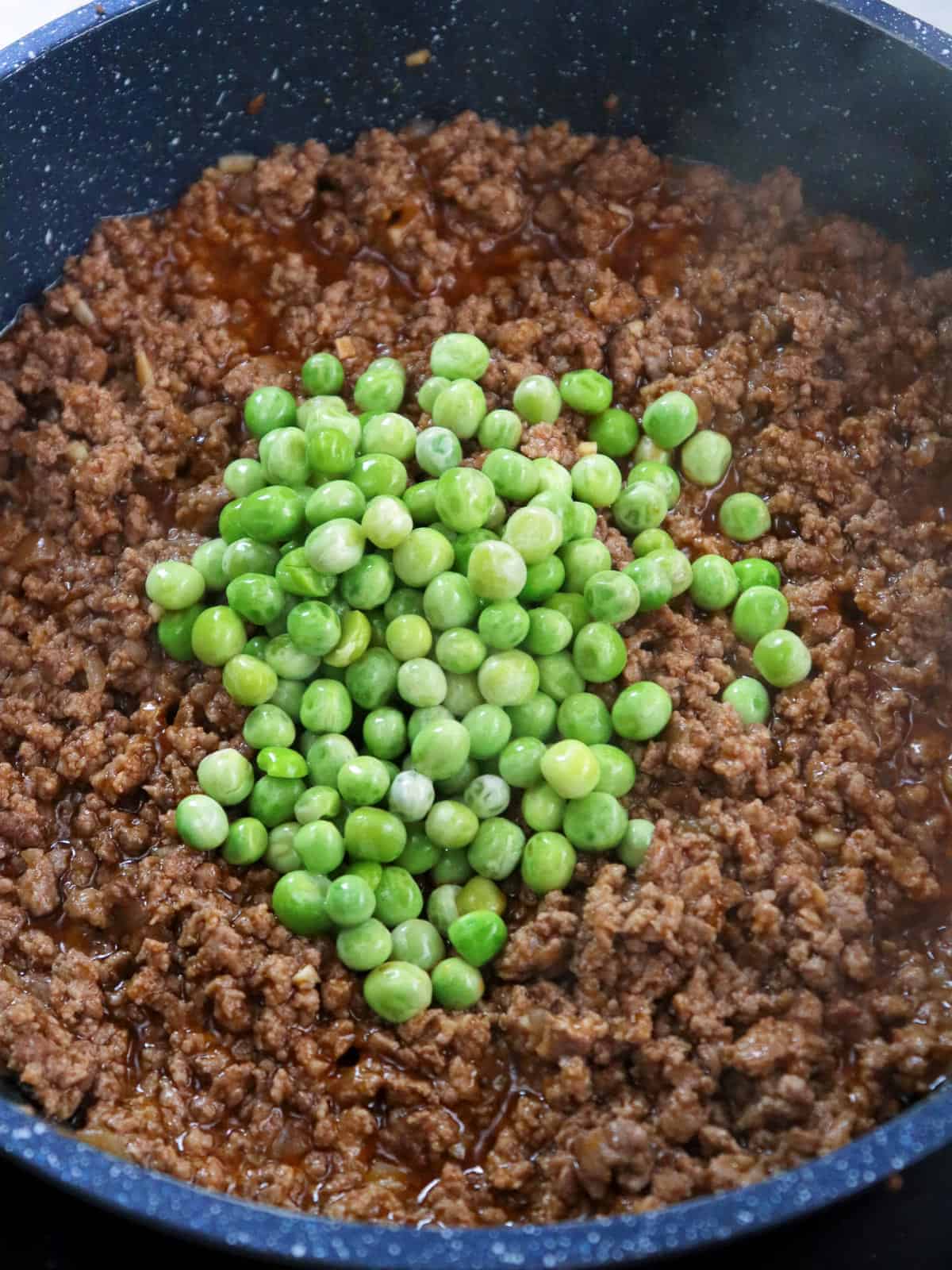 cooking Filipino arroz cubano in a skillet