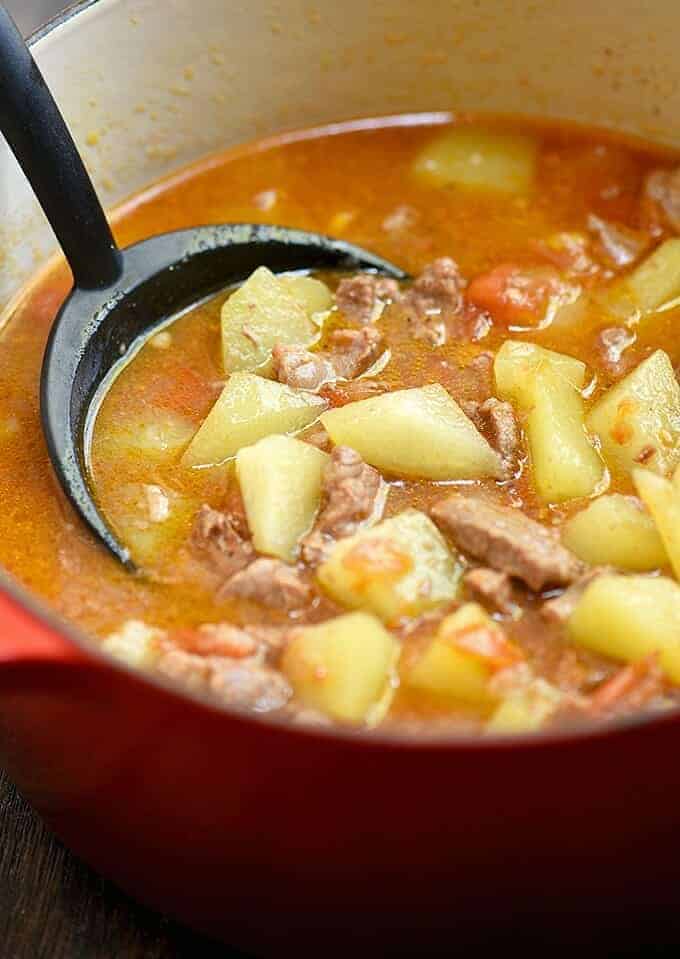 Picadillo with beef and chayote in a red dutch oven