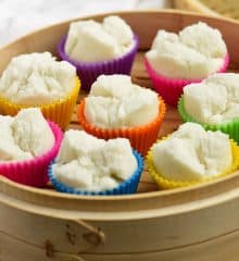 steamed puto on a wooden steamer basket