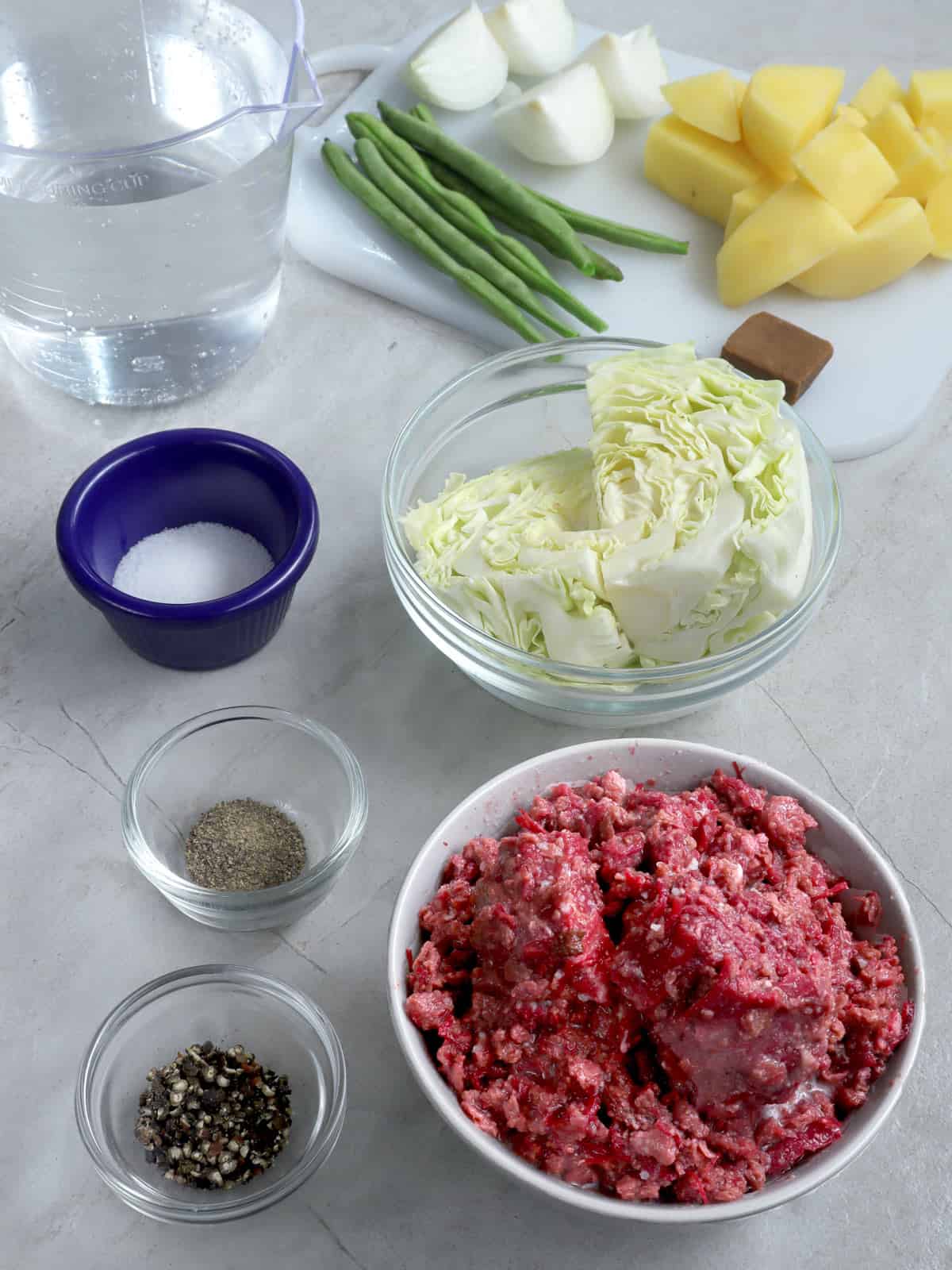 canned corned beef, cabbage, green beans, peppers, salt, potatoes, water