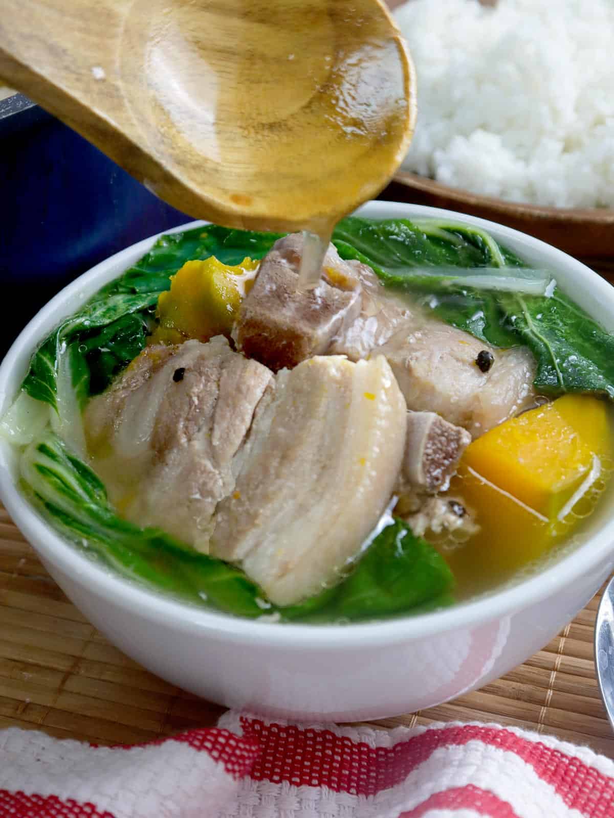 serving nilagang baboy in a bowl