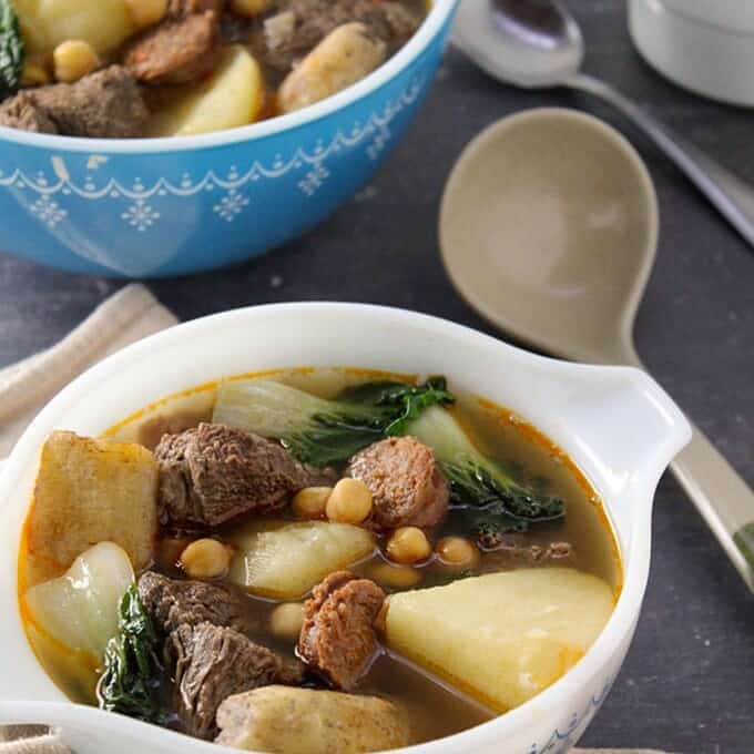 filipino-style beef soup in a bowl