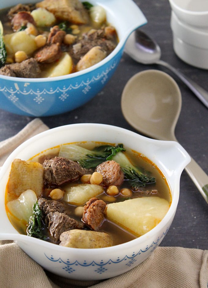 filipino-style beef soup in a bowl