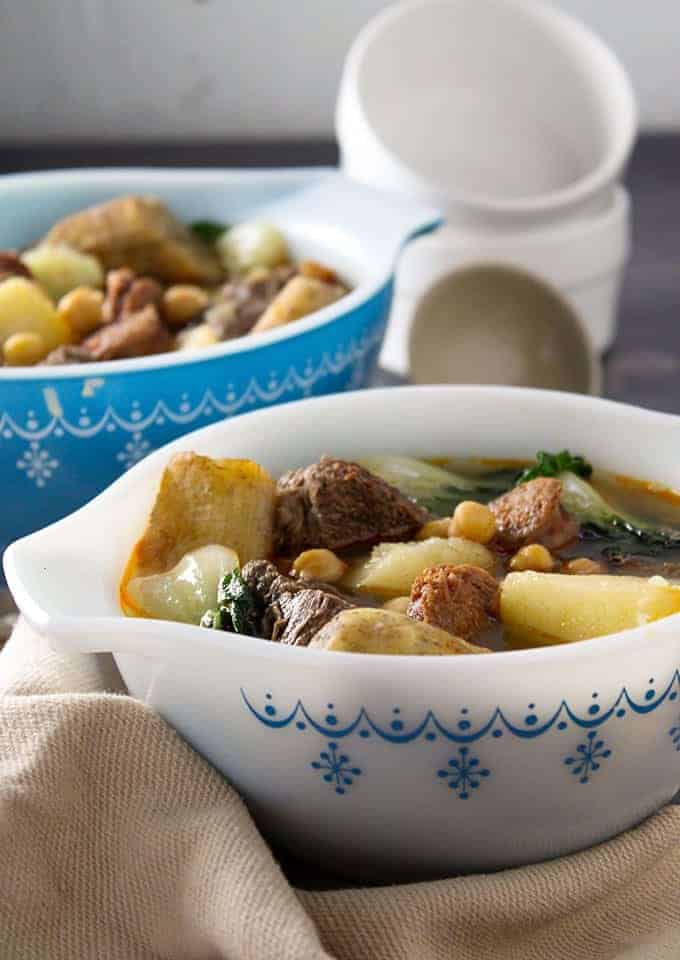 Cocido-style Nilaga in a white bowl