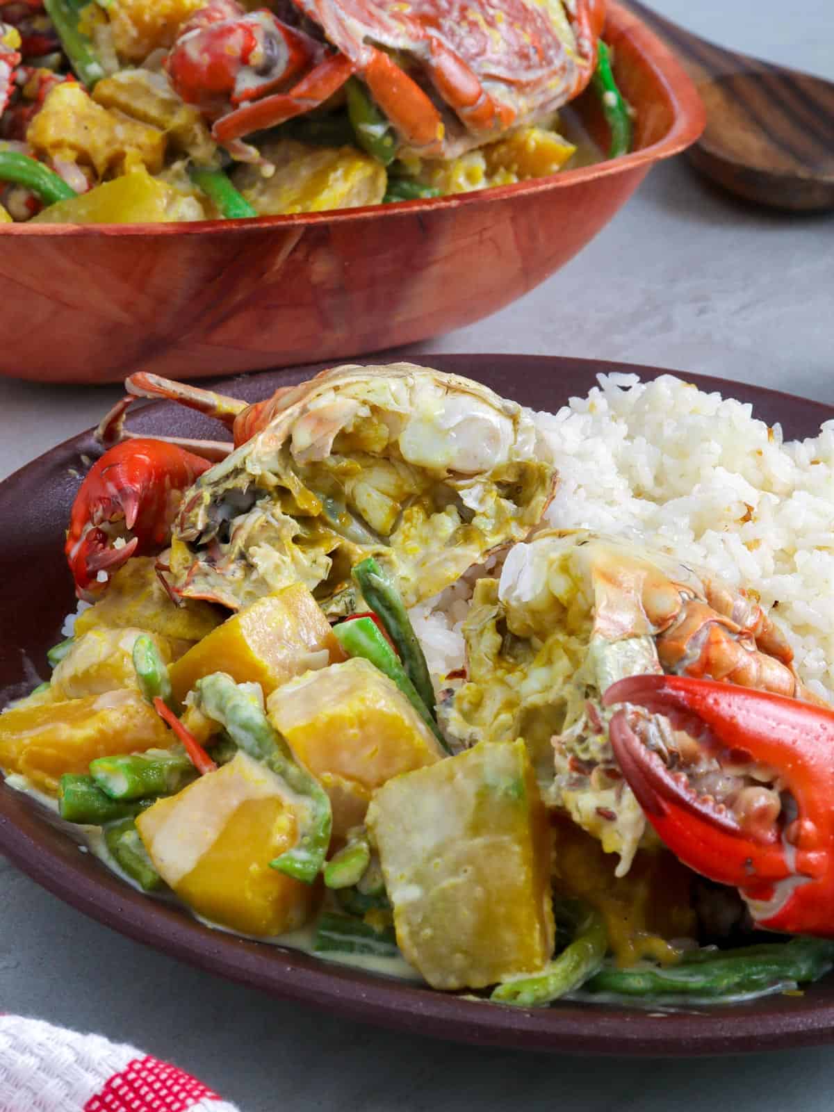 ginataang alimasag on a plate with steamed rice