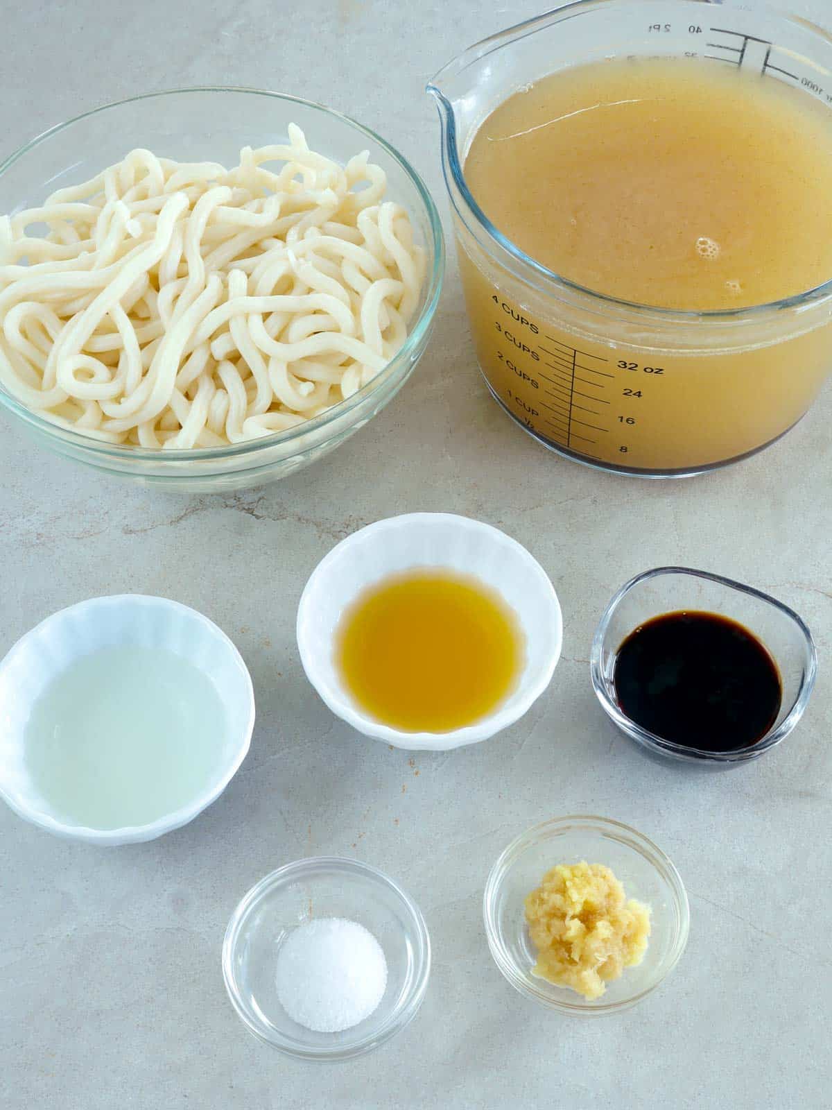 udon, dashi, soy sauce, ginger, mirin, sake, salt