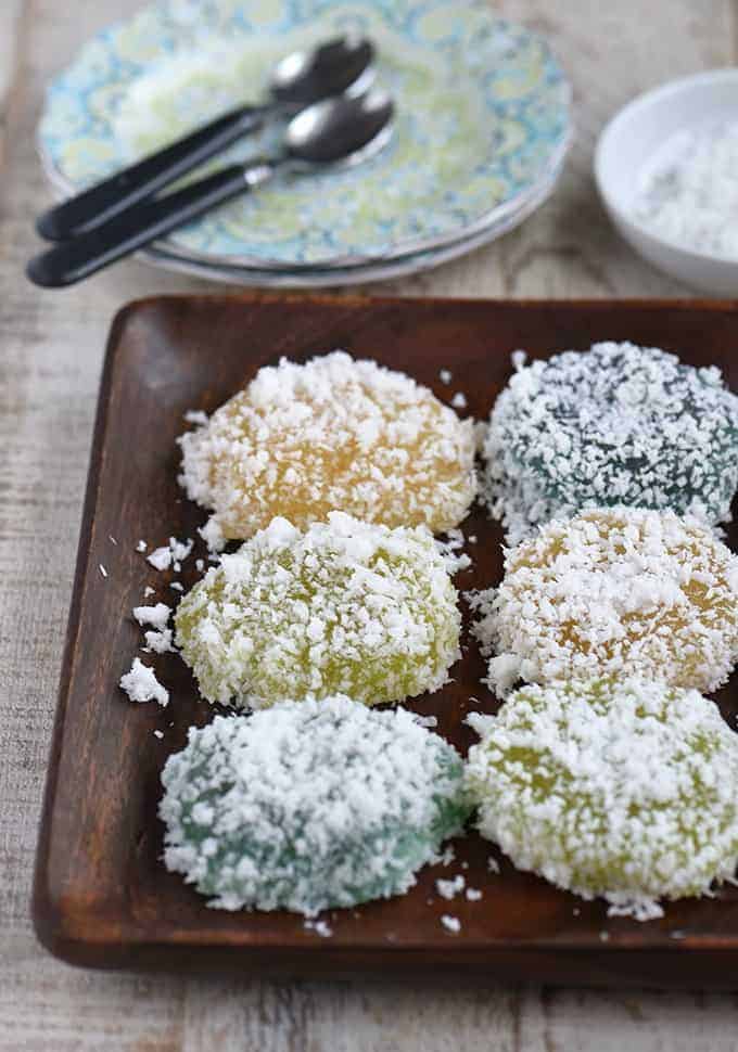 pichi-pichi with different flavors and coated with grated coconut on a wooden serving platter