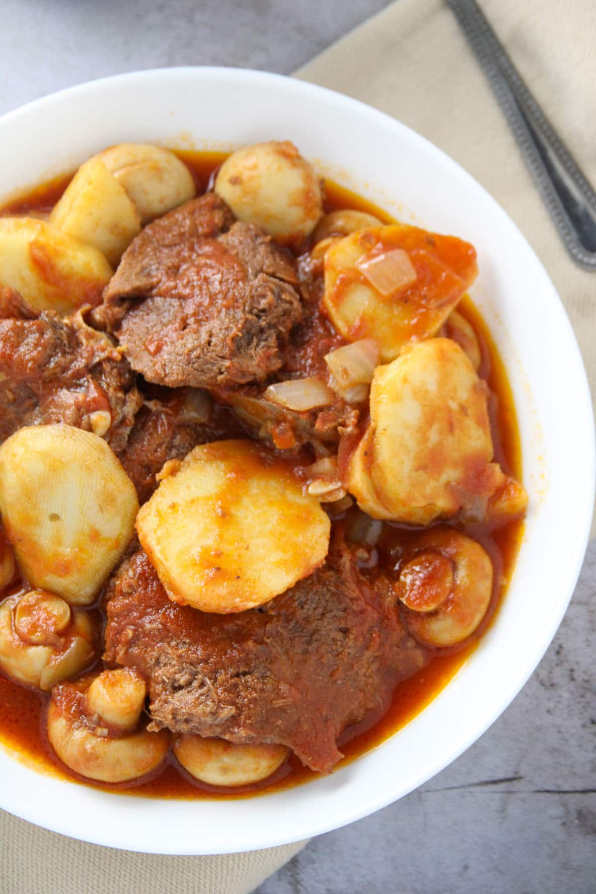 Lengua Estofado in a serving bowl