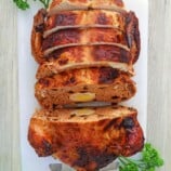 sliced Rellenong Manok on a cutting board