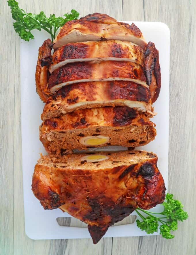 sliced Rellenong Manok on a cutting board