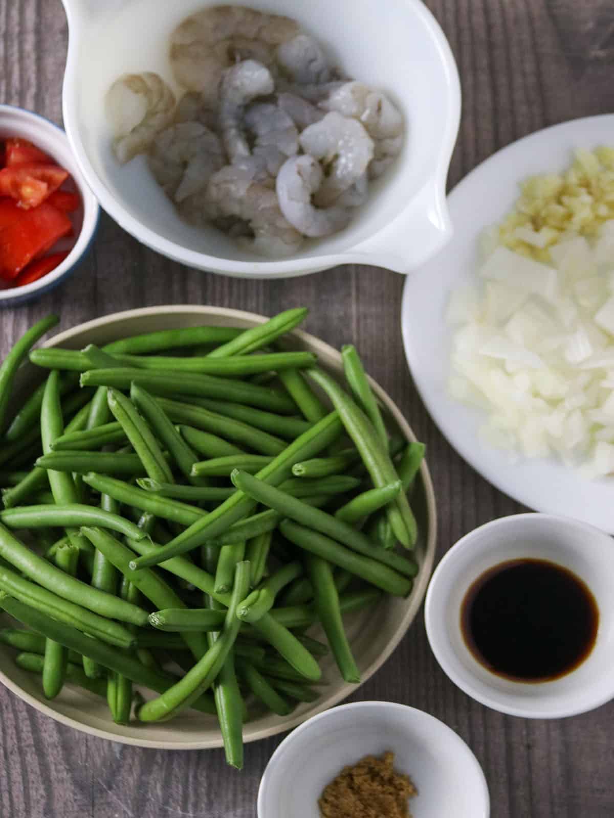 green beans, shrimp, tomatoes, onion, garlic, soy sauce, brown sugar in bowls