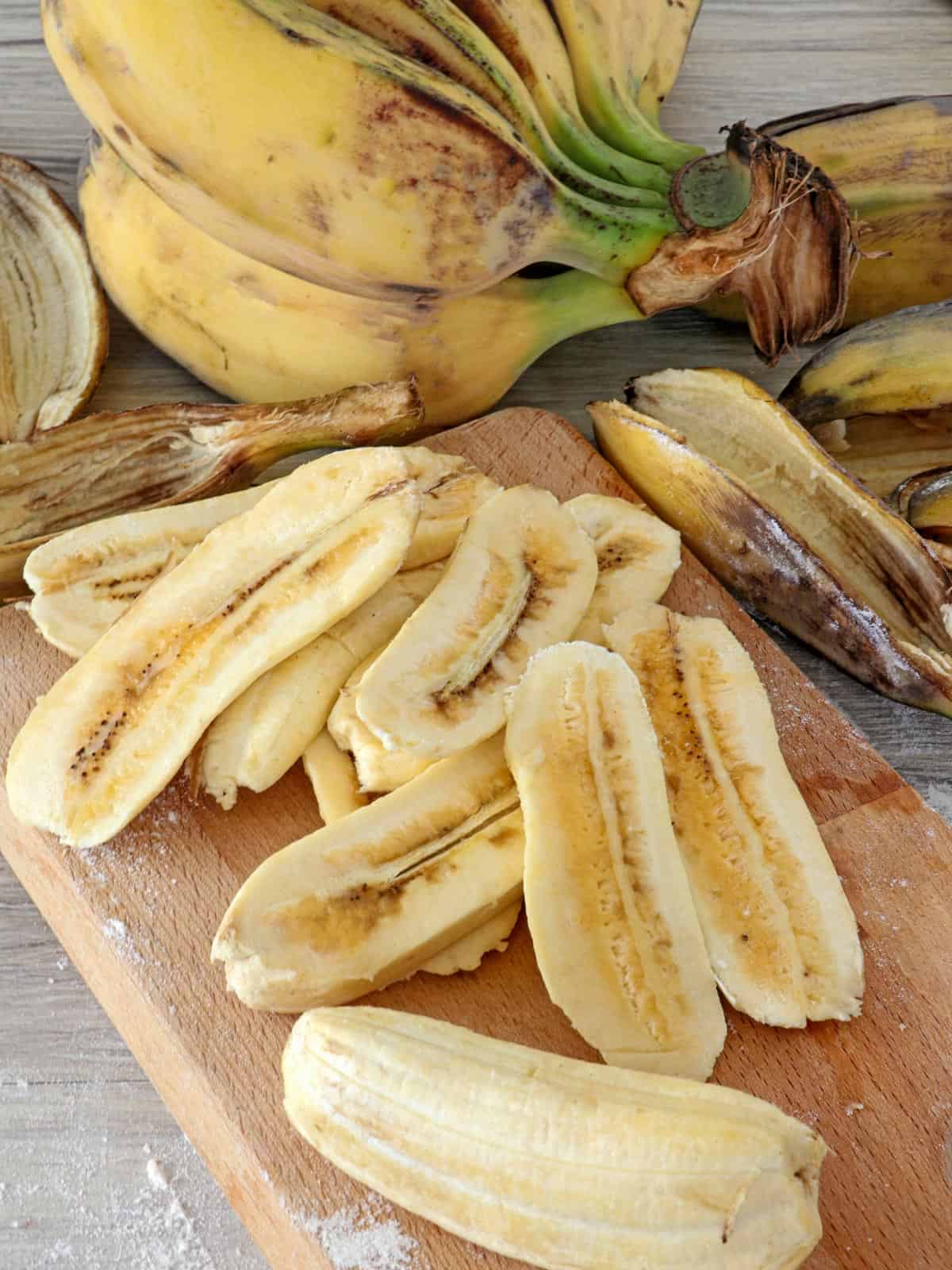 sliced saba bananas on a cutting board