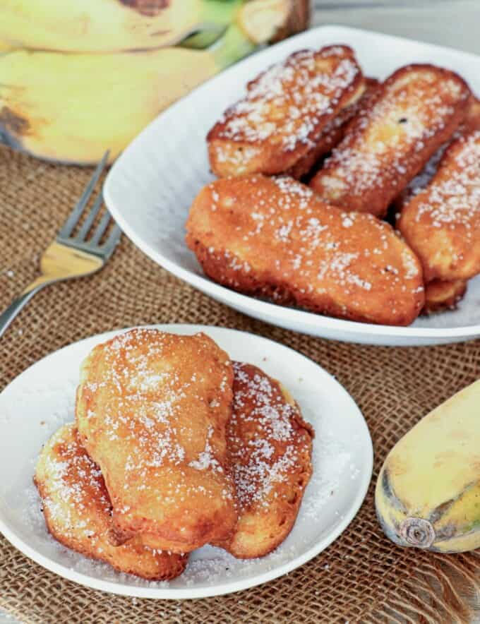 banana fritters on white plates