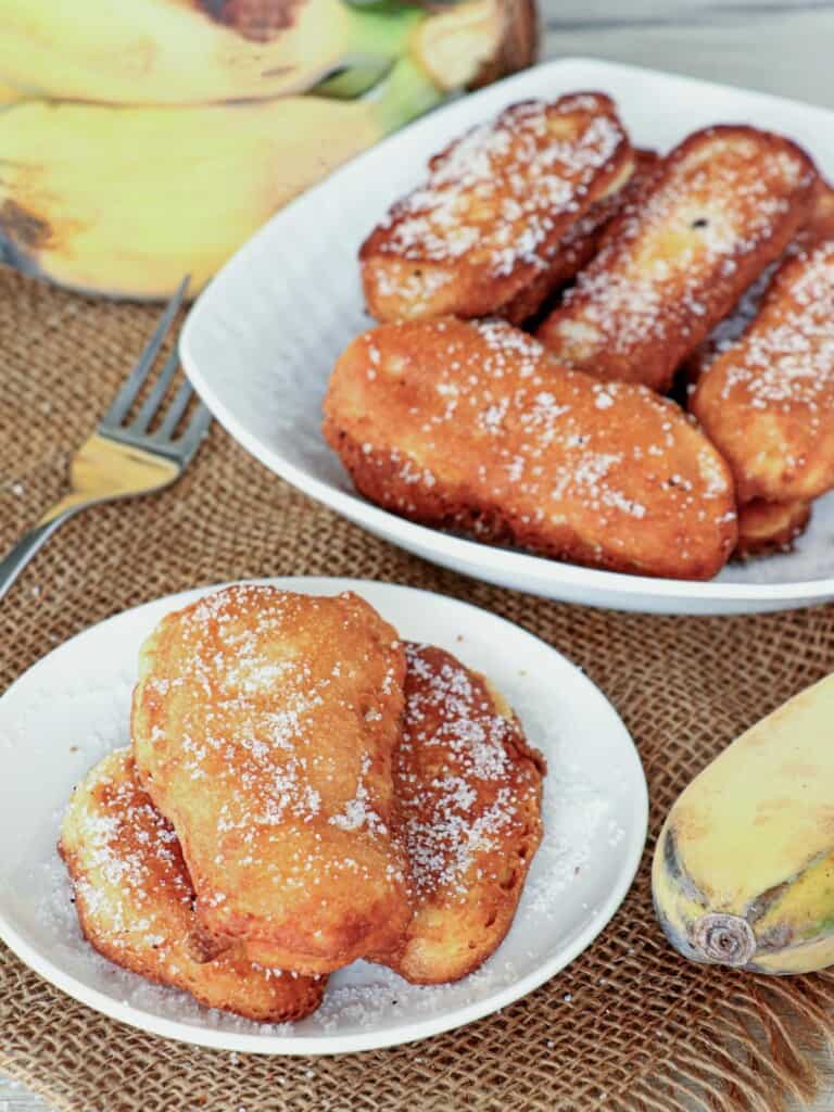 banana fritters on white plates