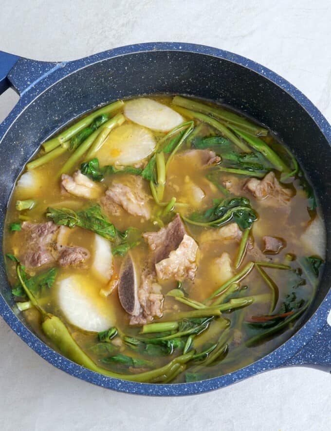 beef sinigang in a pot.