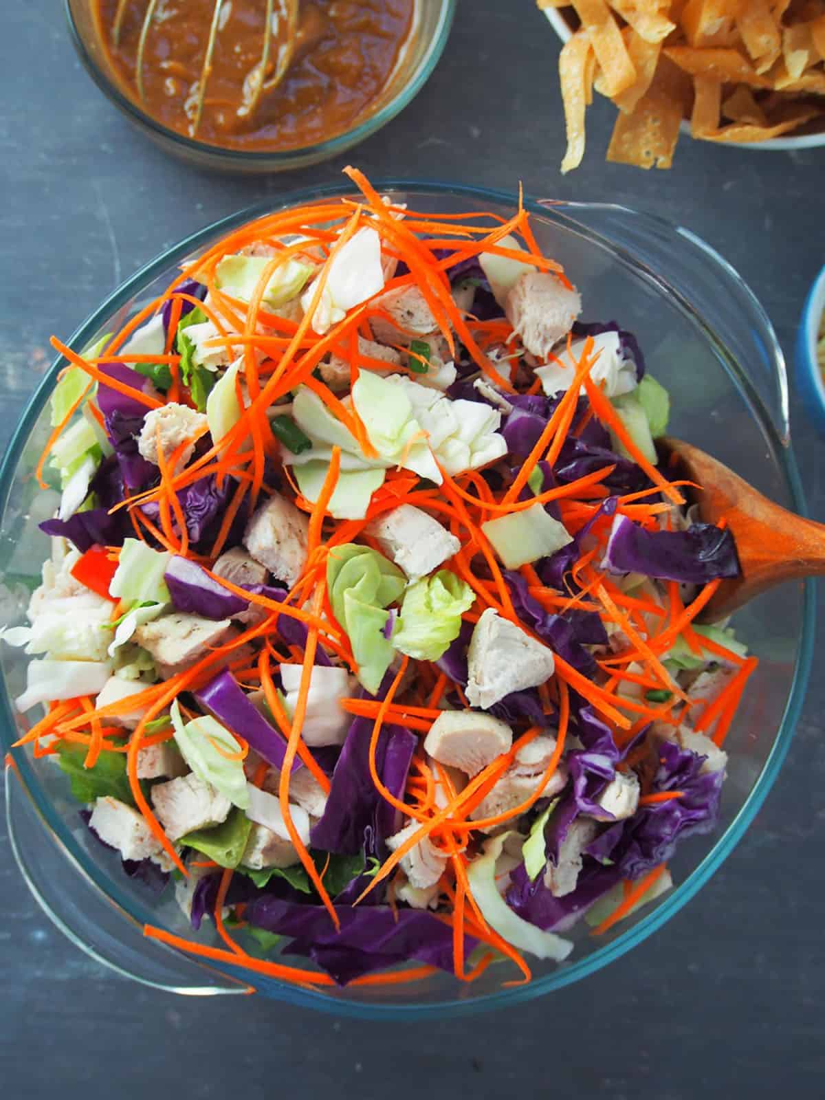 Thai Chicken Salad with Peanut Dressing in a bowl.