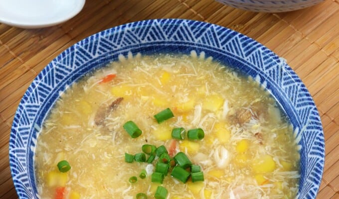 creamy corn crab soup in blue bowls