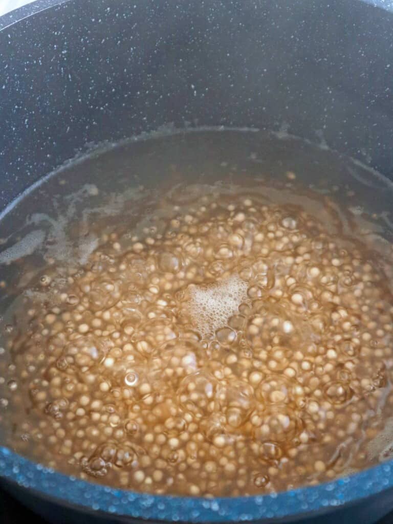 cooking sago pearls in a pot