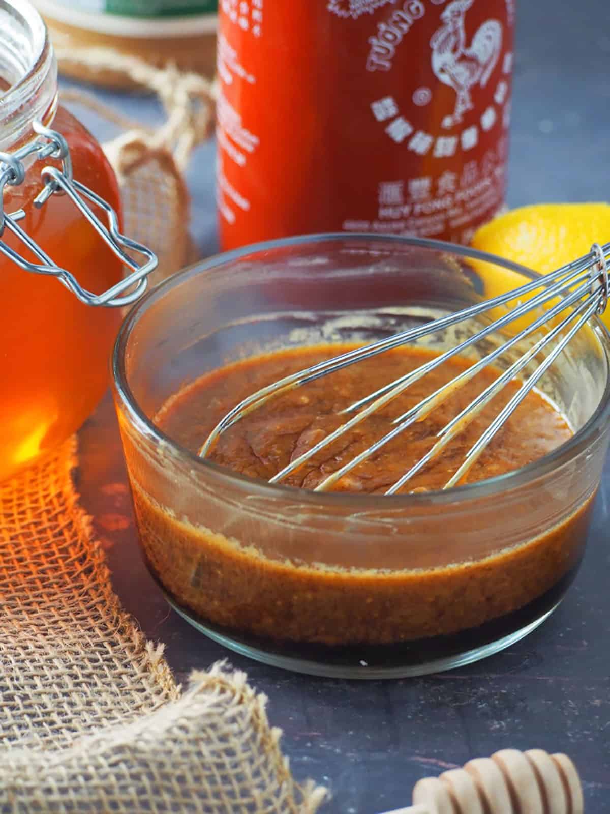 making peanut dressing in a bowl.