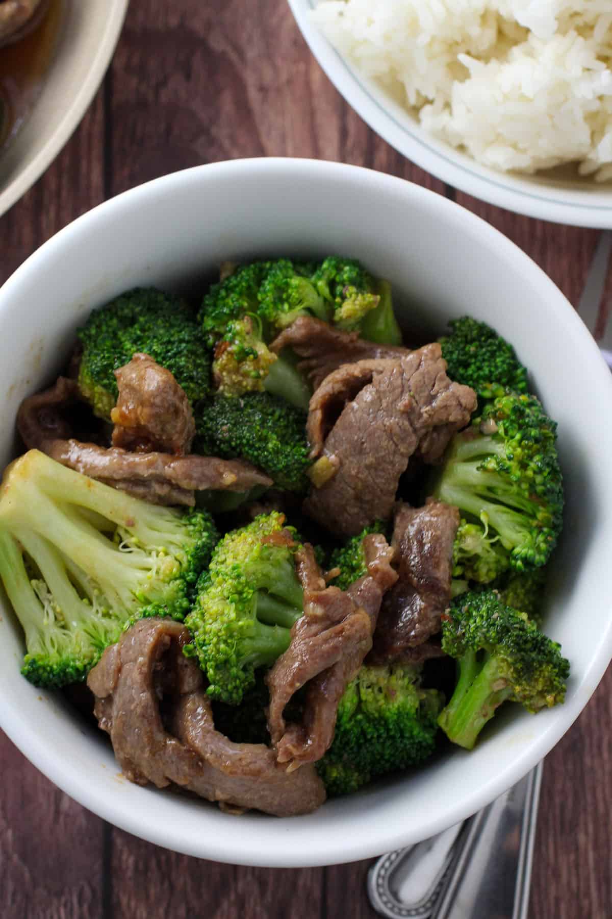 beef broccoli in a white bowl