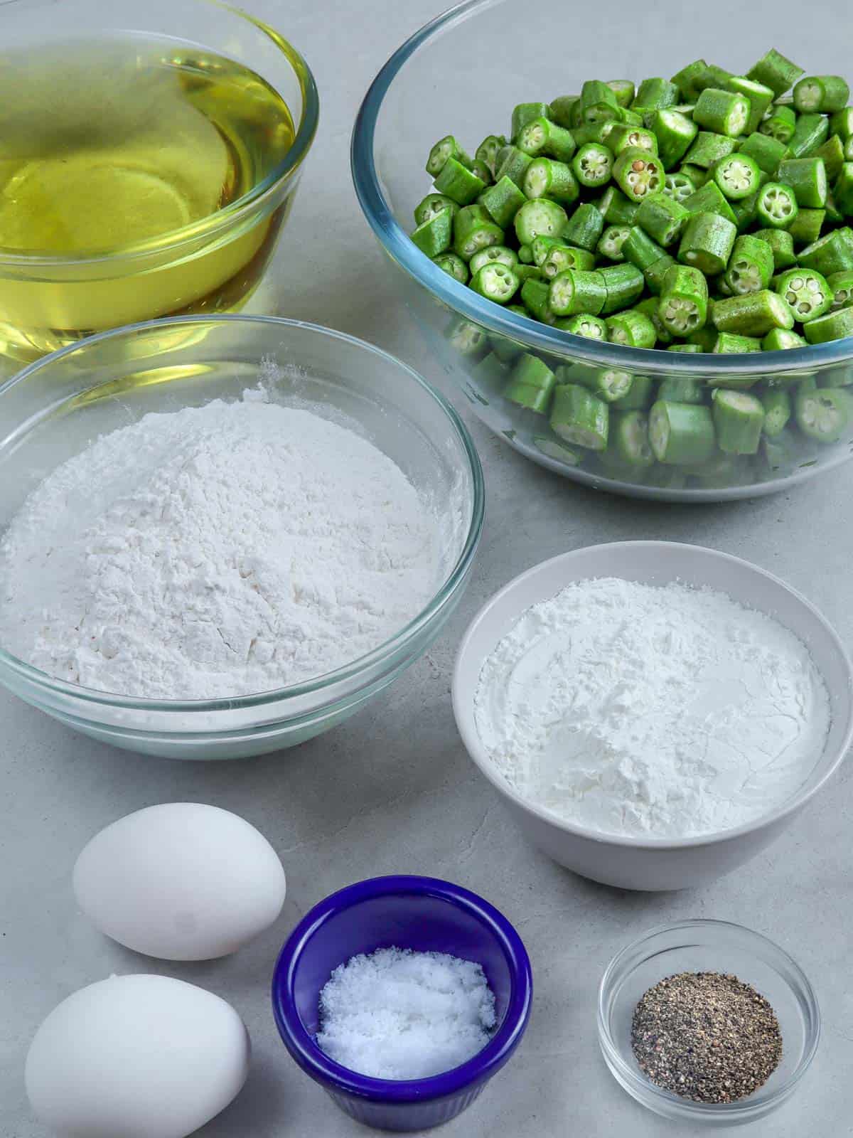 sliced okra, flour, cornstarch, oil, eggs, salt, and pepper