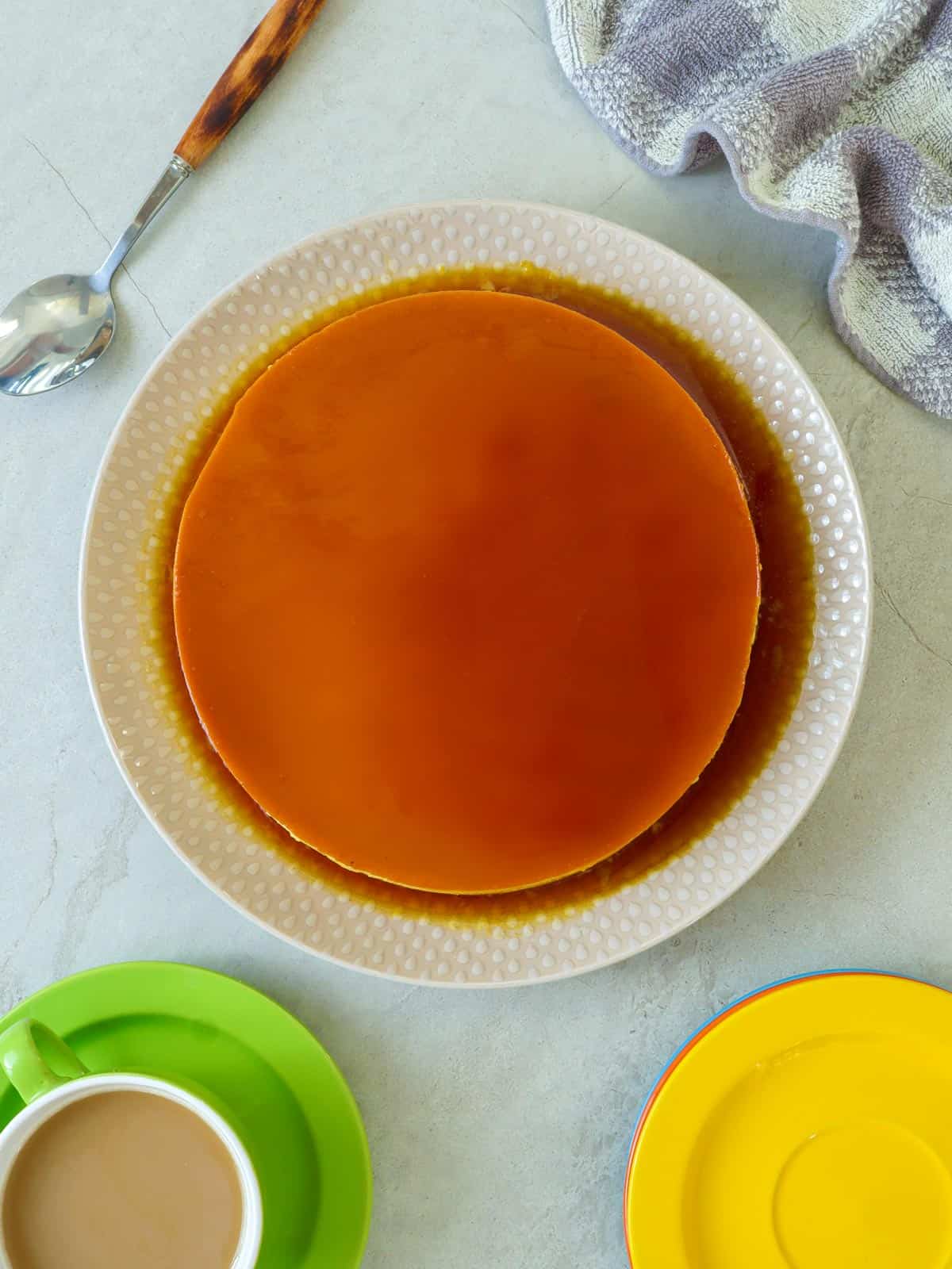 Cream Cheese Flan on white serving platter