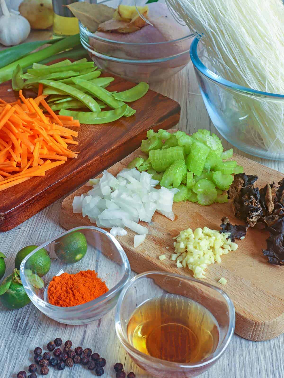 carrots, celery, mushrooms, fish sauce, chopped onions, garlic