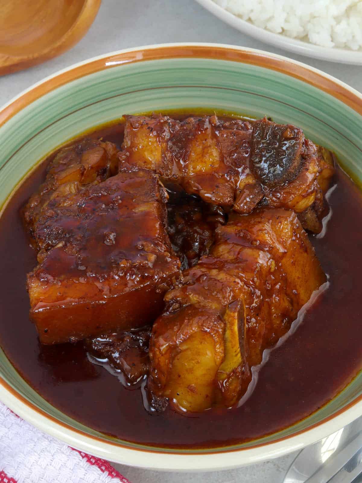 adobong pula in a serving bowl