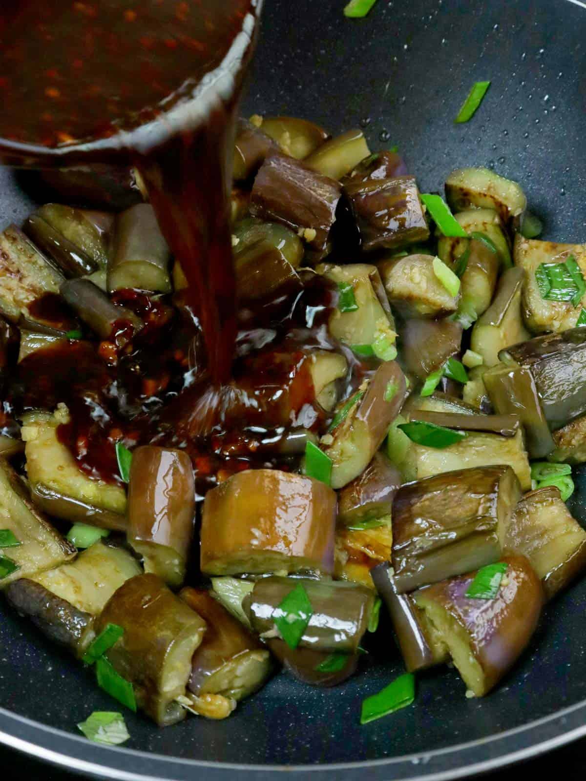 pouring sauce in pan