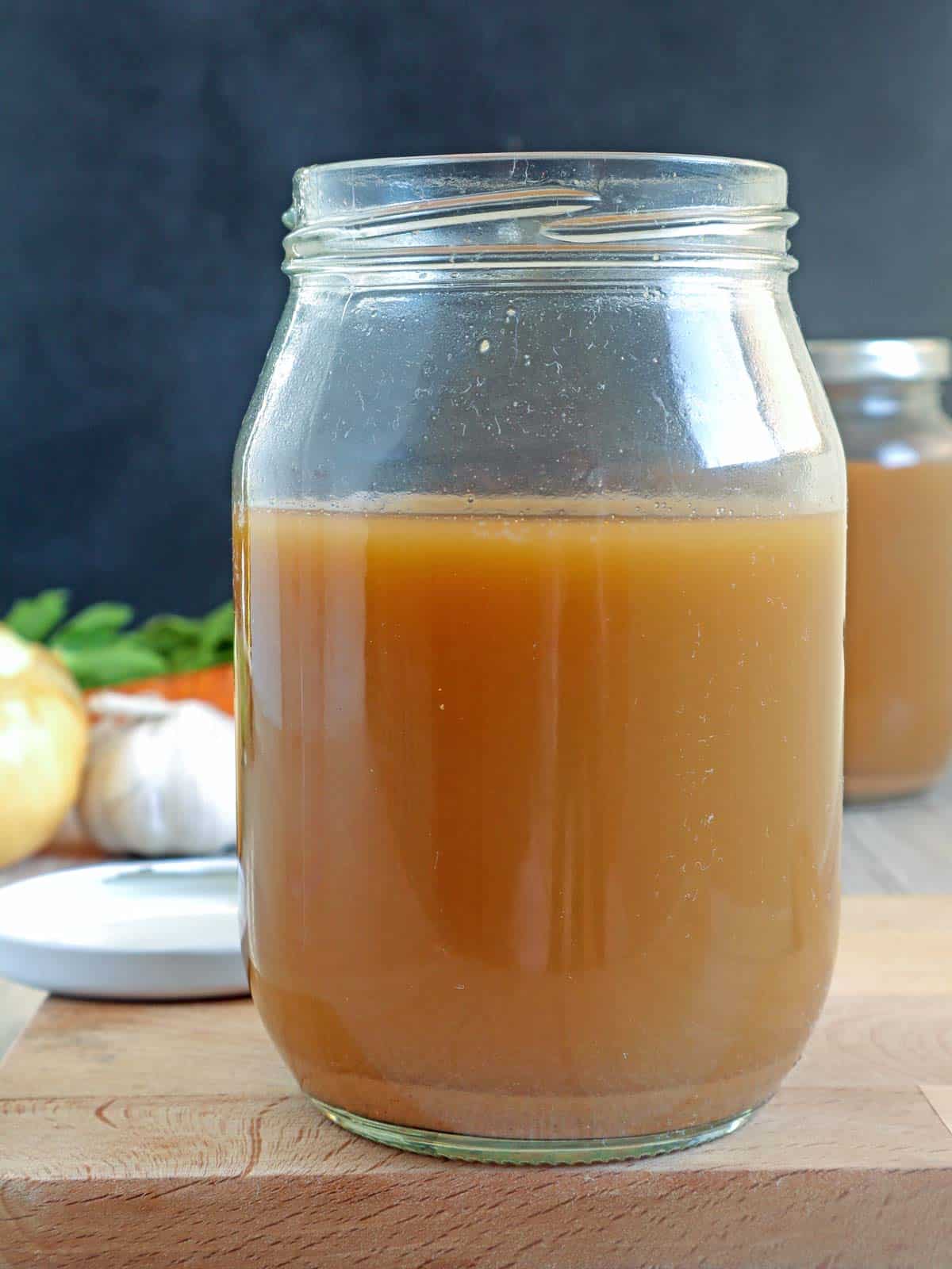 homemade shrimp stock in a mason jar