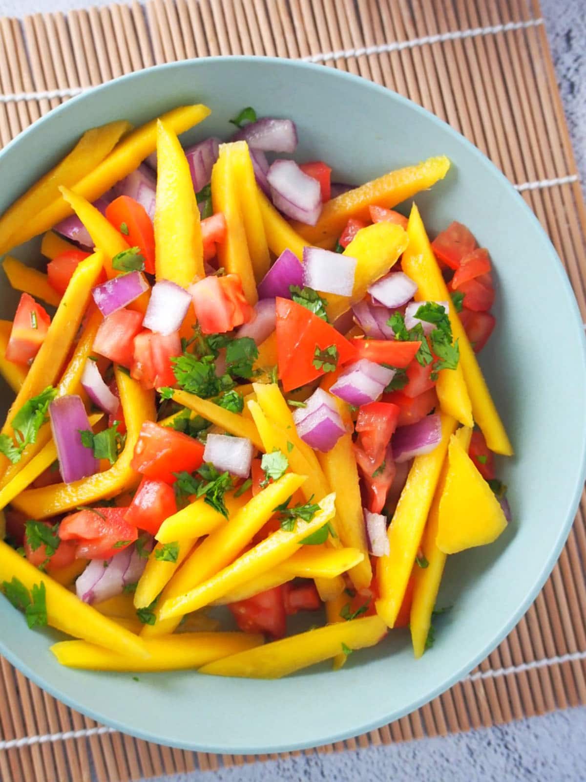 Filipino Mango and Tomato Salad in a bowl