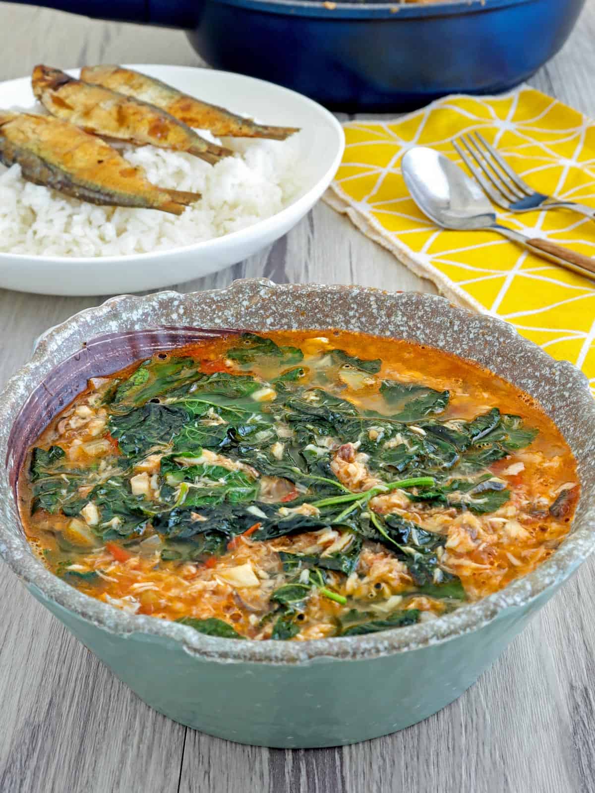 Ginisang Ampalaya Leaves with Tinapa in a serving bowl