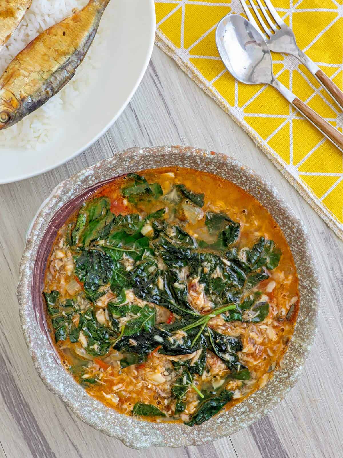 Ginisang Ampalaya Leaves with Tinapa in a serving bowl