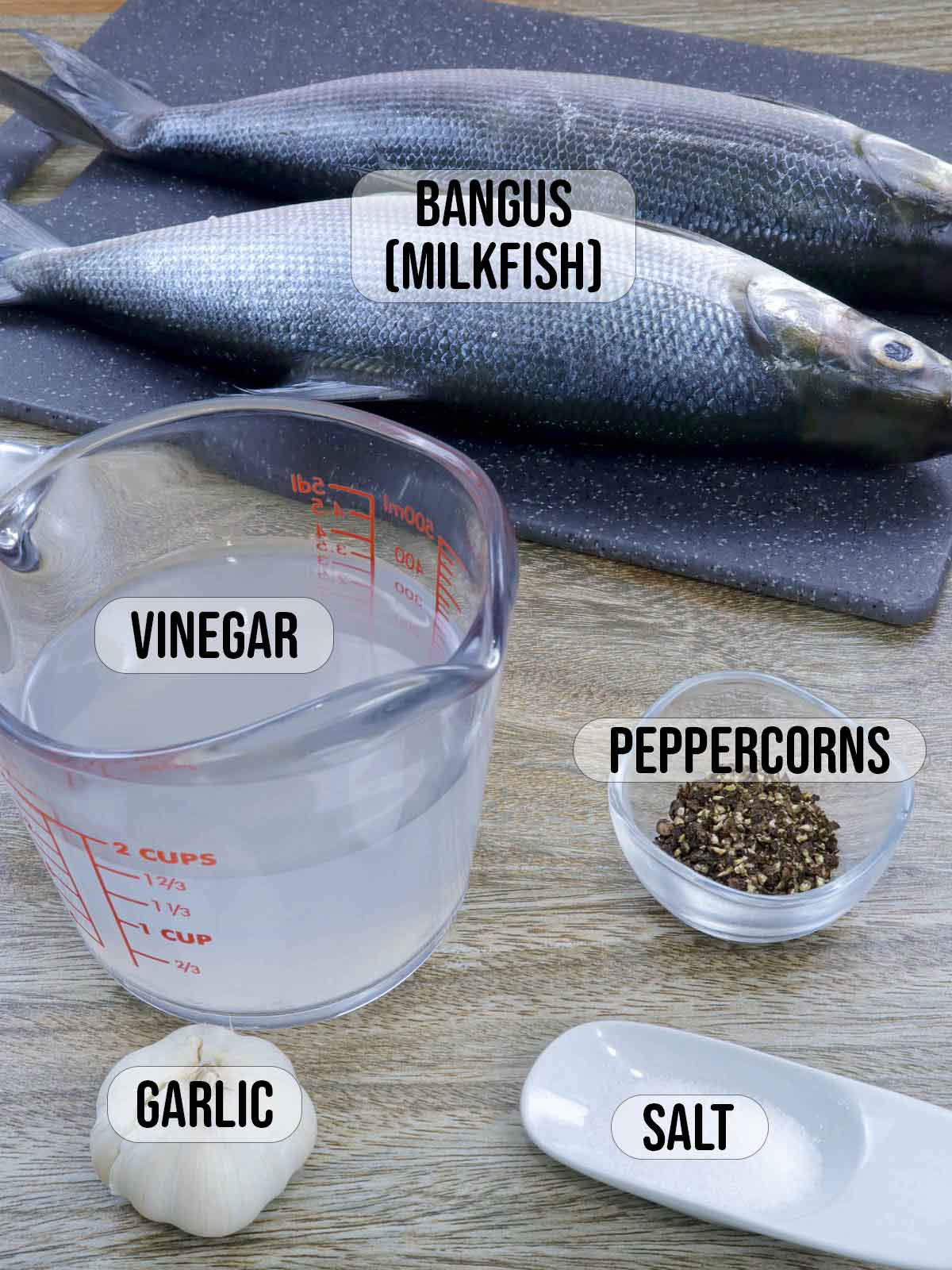 milkfish, vinegar, garlic, peppercorns.